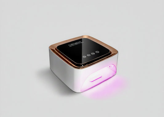 Nail dryer with digital display and USB charging cable on a white background