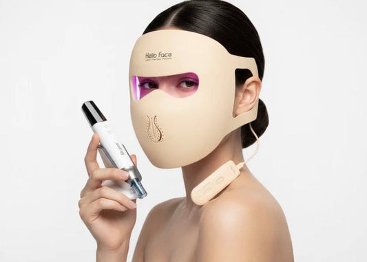 Woman wearing a facial mask with a bottle of skincare product on a white background
