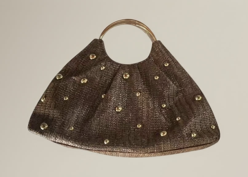 Brown handbag with gold studs on a white background